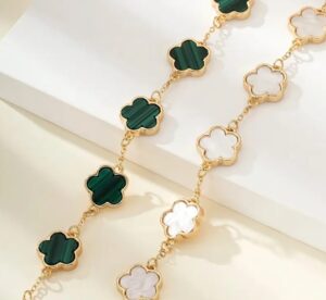 elegance with this Classic Black & Green Clover Bracelet Set